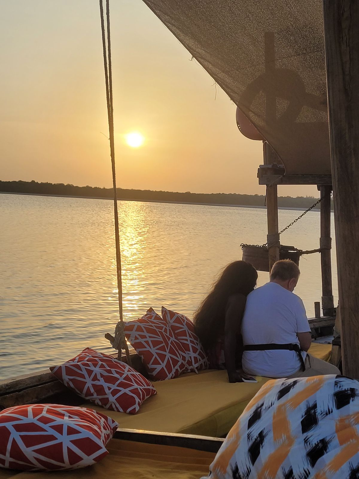 Watching the sun set over the water